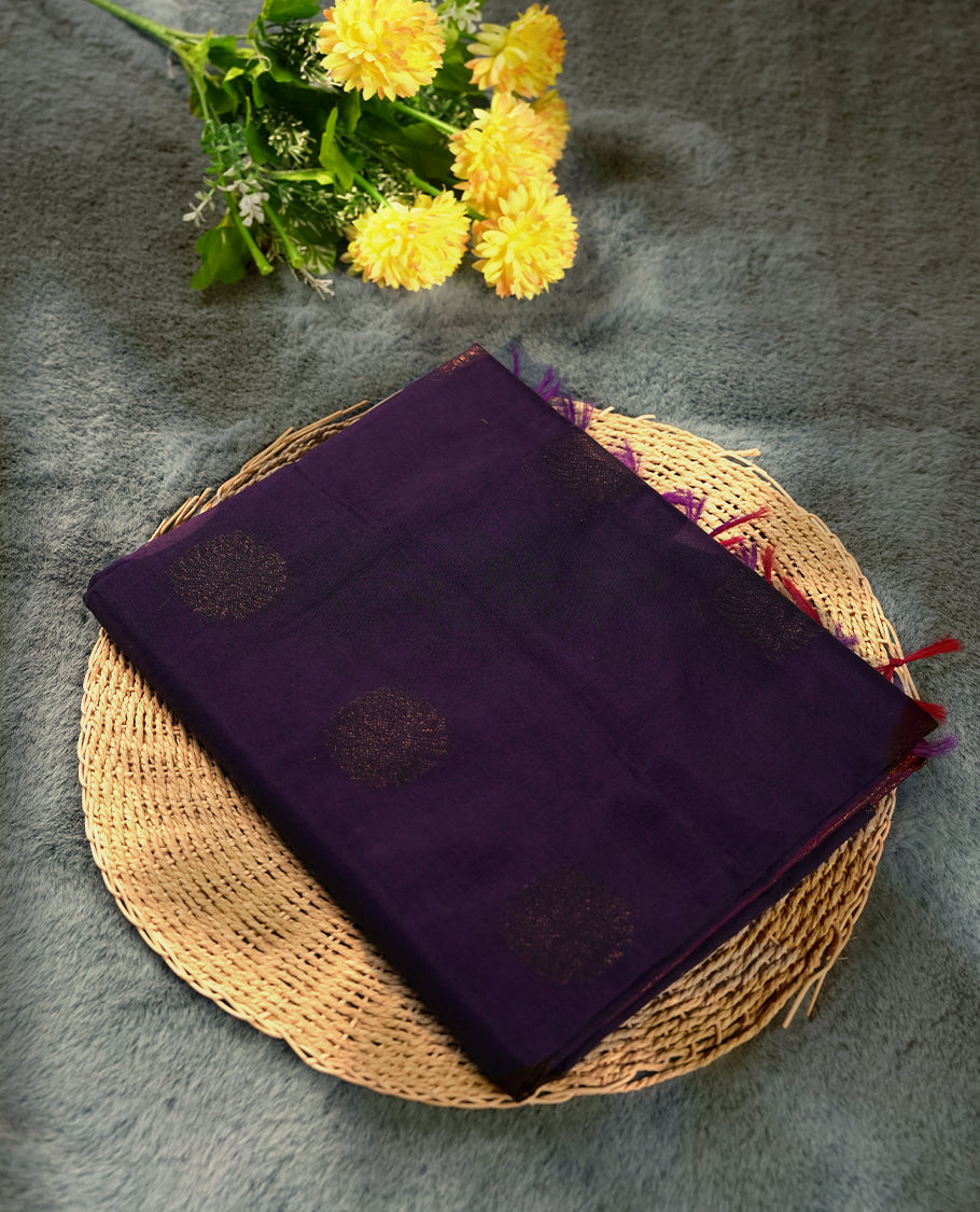 Purple colour soft silk cotton saree adorned with copper zari motifs and a shimmering copper zari border, Enhanced by a beautifully rich wine colour woven pallu & Comes with a matching blouse piece for a complete look.
