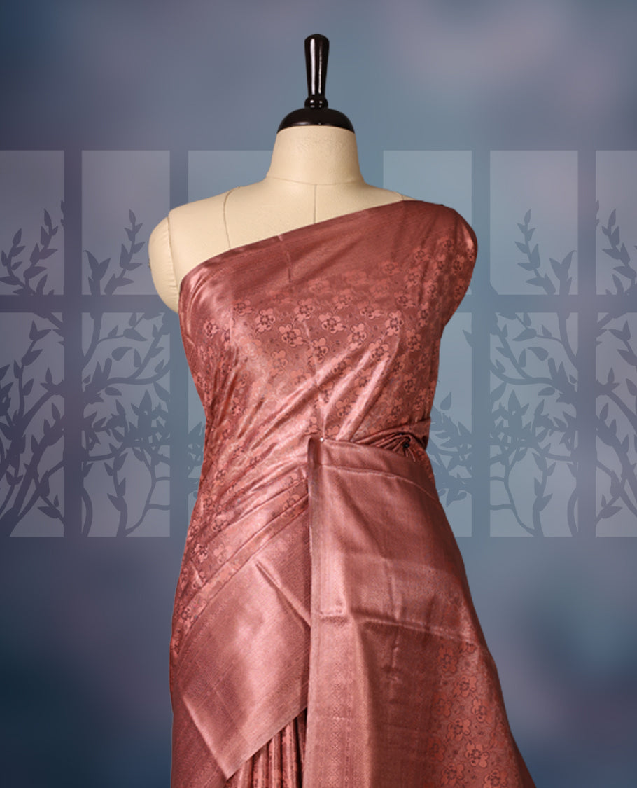 Pastel onion colour semi silk saree brocade saree featuring intricate self-design brocade patterns across the body, complemented by a rich self-colour woven border and pallu, paired with a matching blouse.