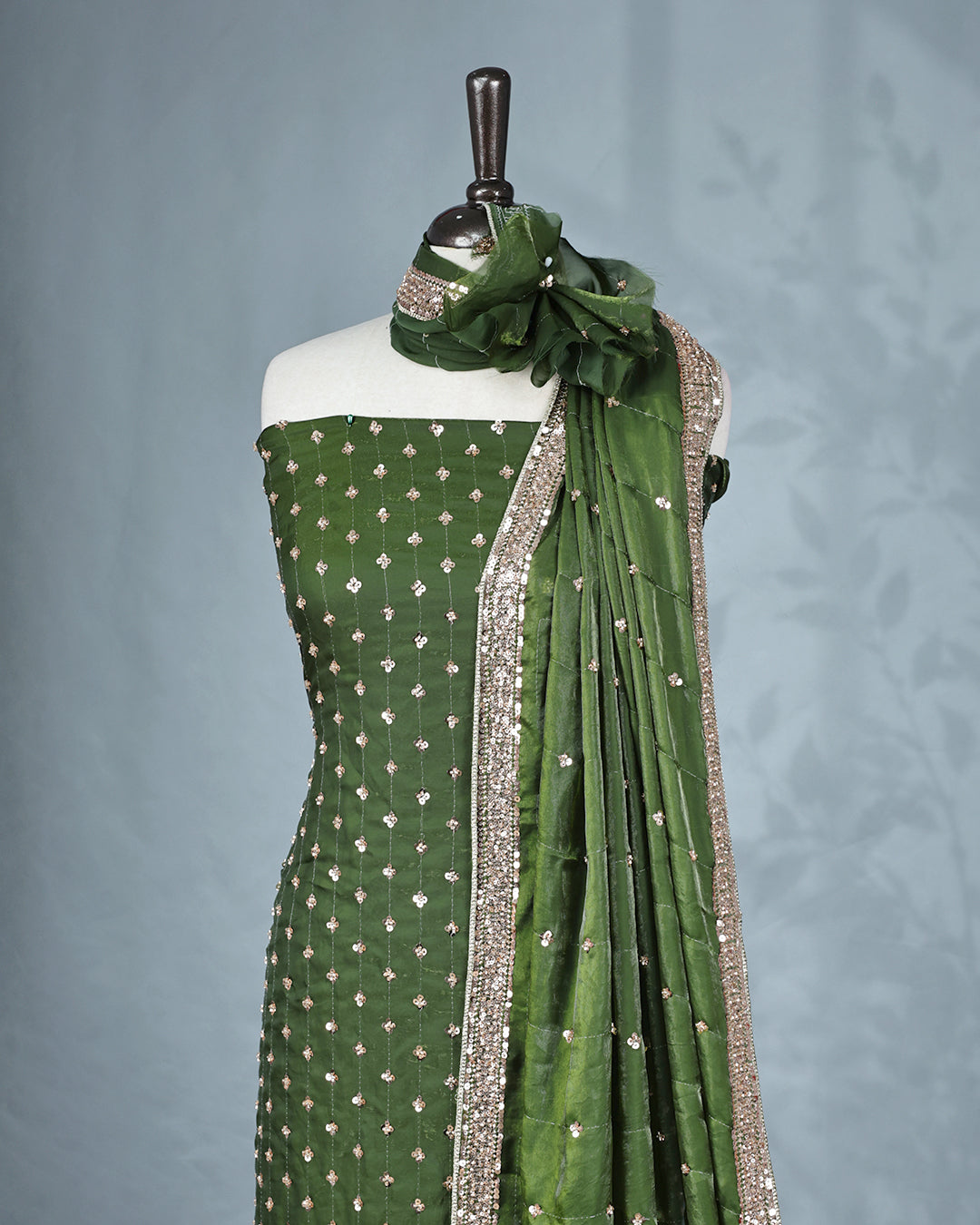 Green colour salwar material with Cut beats & sequins work on body, Matching Bottom & dupatta.
