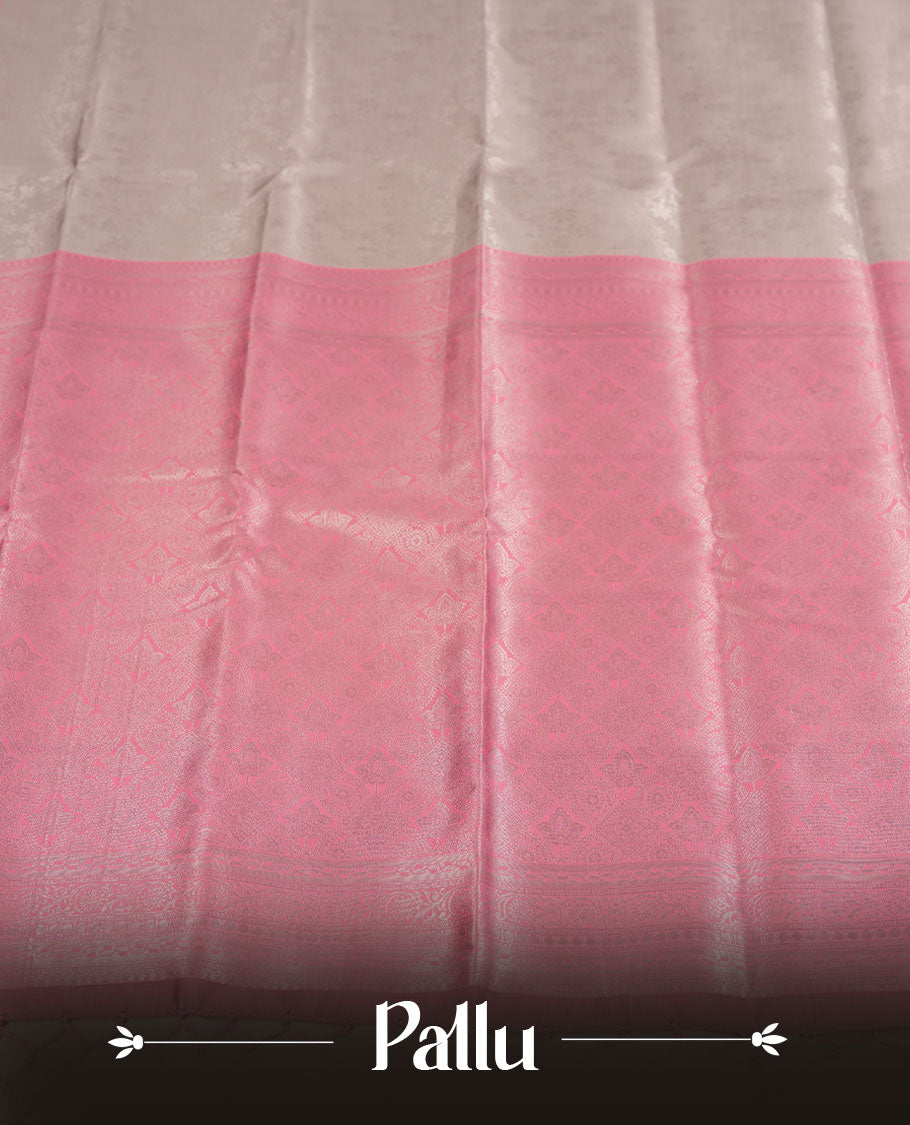 Champagne Beige colour Semi Silk Saree with Allover Subtle Floral Self-Weave on the Body, Contrasting Baby Pink Zari Woven Pallu and Border Featuring Intricate Geometric Motifs and Tassels, Paired with Coordinated Blouse Piece