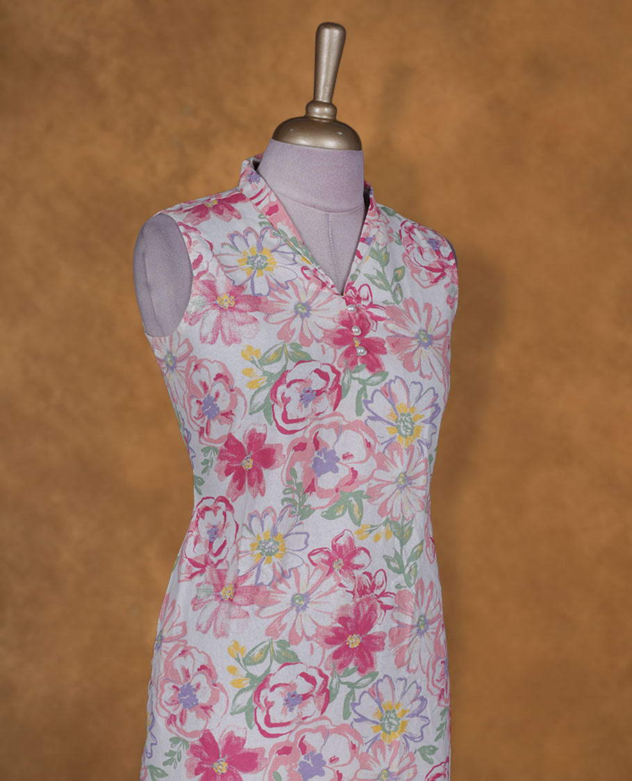 Off white colour kurti by VISMAY with vibrant multicolour floral prints, knee length design, styled with a V collar neckline and a sleeveless finish.
