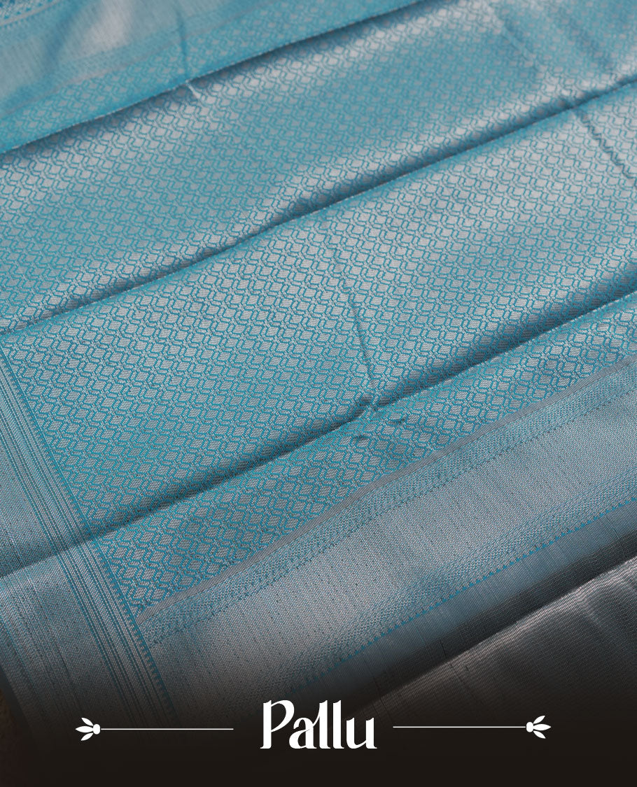 Aqua blue colour semi silk saree featuring neem zari Brocade Pattern all over the body, complemented by a Self Colour woven border with detailing, Pallu & blouse.