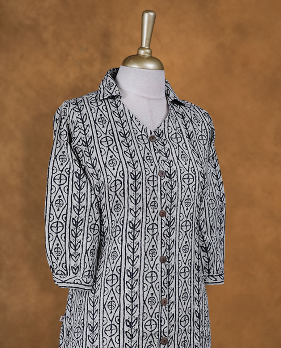Gray colour button down kurti BY VISMAY with an all over black Geometric & floral print, straight calf length silhouette, classic shirt collar, and elbow length sleeves.