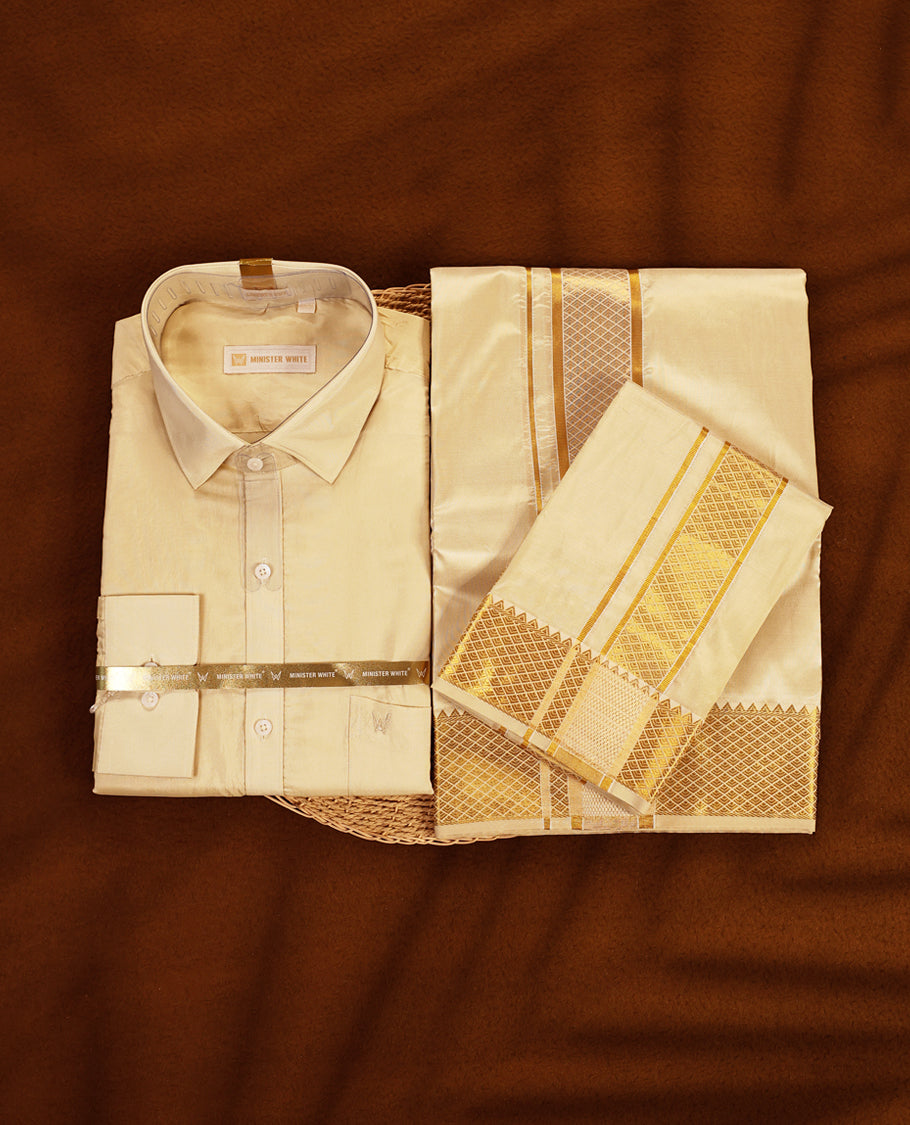 Fawn gold coloured silk wedding shirt, dhoti, and towel set from MINISTER WHITE, adorned with an elegant gold zari border, making it an ideal choice for weddings, festive occasions, and traditional celebrations.