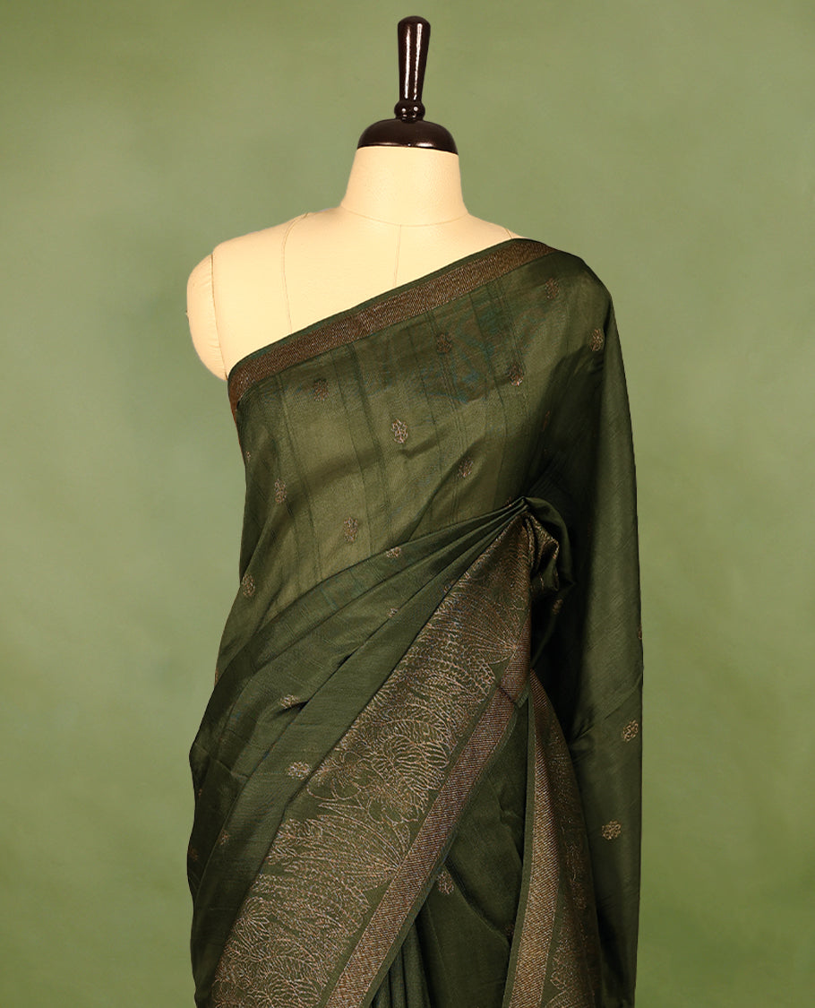 Army Green semi-Banaras tussar georgette saree adorned with antique zari floral motifs on the body, beautifully highlighted with a pencil art garden-inspired border, paired with a matching blouse.