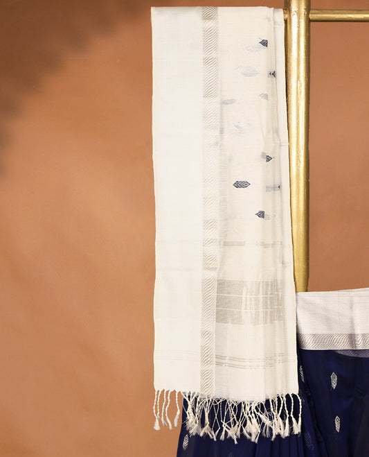Deep Blue colour Maheshwari Cotton saree featuring Antique Zari Patterns across the entire body, complemented by a traditional White coloured border & Pallu, with a matching blouse.