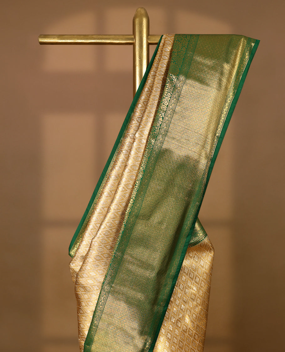 Golden Colour Tissue Semi Silk Saree having Silver Zari Worked Body and Blouse with Green Border