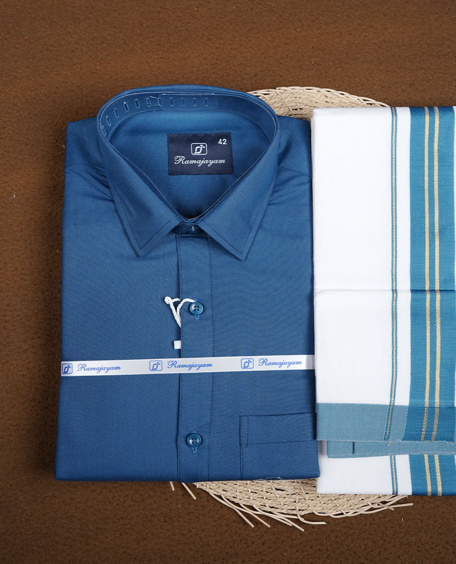 Dark Blue Colour shirt paired with a matching dhoti, finished with a teal blue and gold border.