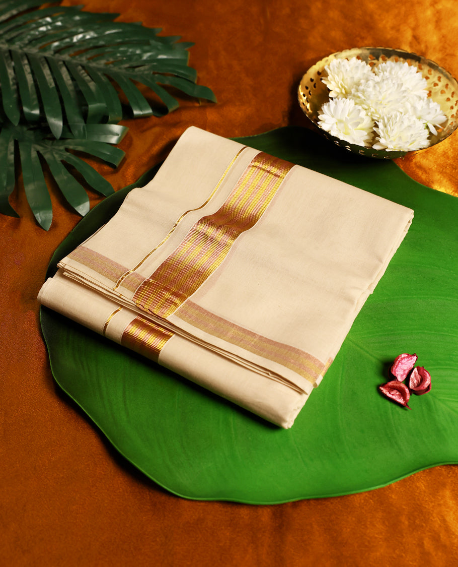 Traditional off white colour pure handloom cotton dhoti featuring a vibrant golden yellow and pink striped border, blending festive charm with comfort, making it an ideal choice for temple visits and cultural occasions.
