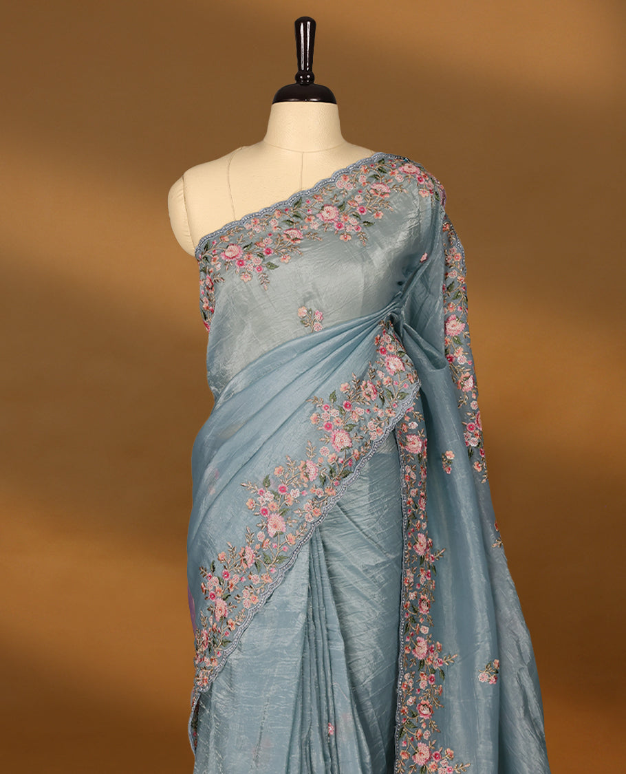 Dusty Blue Crush Soft Silk saree featuring Floral Thread Works on the body, complemented by delicate floral embroidery border and a matching blouse.