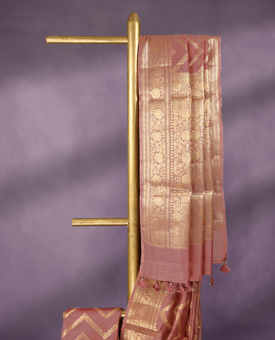 Onion Pink colour pure Banarasi Chanderi cotton, beautifully adorned with traditional antique zig zag Kodi designs across the body, completed with a hand-dyed colour, a traditional border, and a matching blouse.