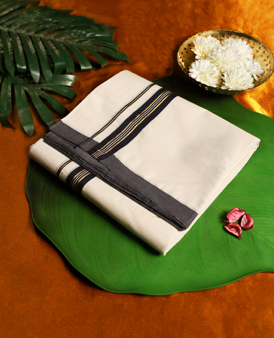 Classic off white colour cotton dhoti adorned with a striking black border enhanced with fine golden zari lines, blending tradition with elegance, ideal for festive wear, rituals, and cultural occasions.