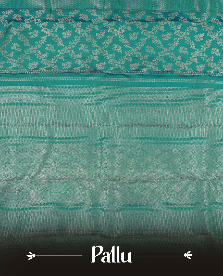 Peacock blue colour Kanchipuram pattern Manthrakodi saree with double pattern zari jacquard body, antique zari floral design, vertical oosi lines with diamond motifs, elegant zari border, and self jacquard blouse piece.