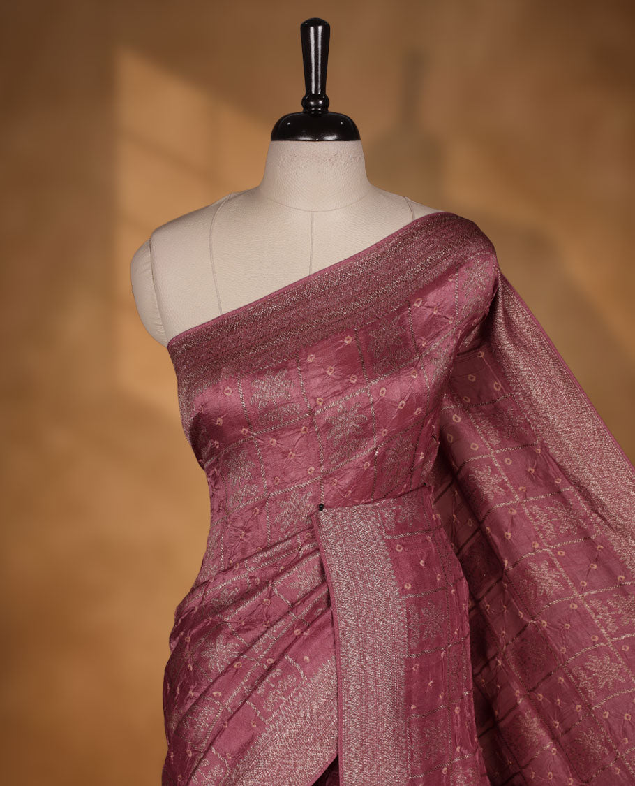 Dark Dusty Pink colour Banarasi Bandhani silk saree featuring with intricate Banarasi motifs on body, complemented by antique zari woven border and grand pallu, paired with matching blouse