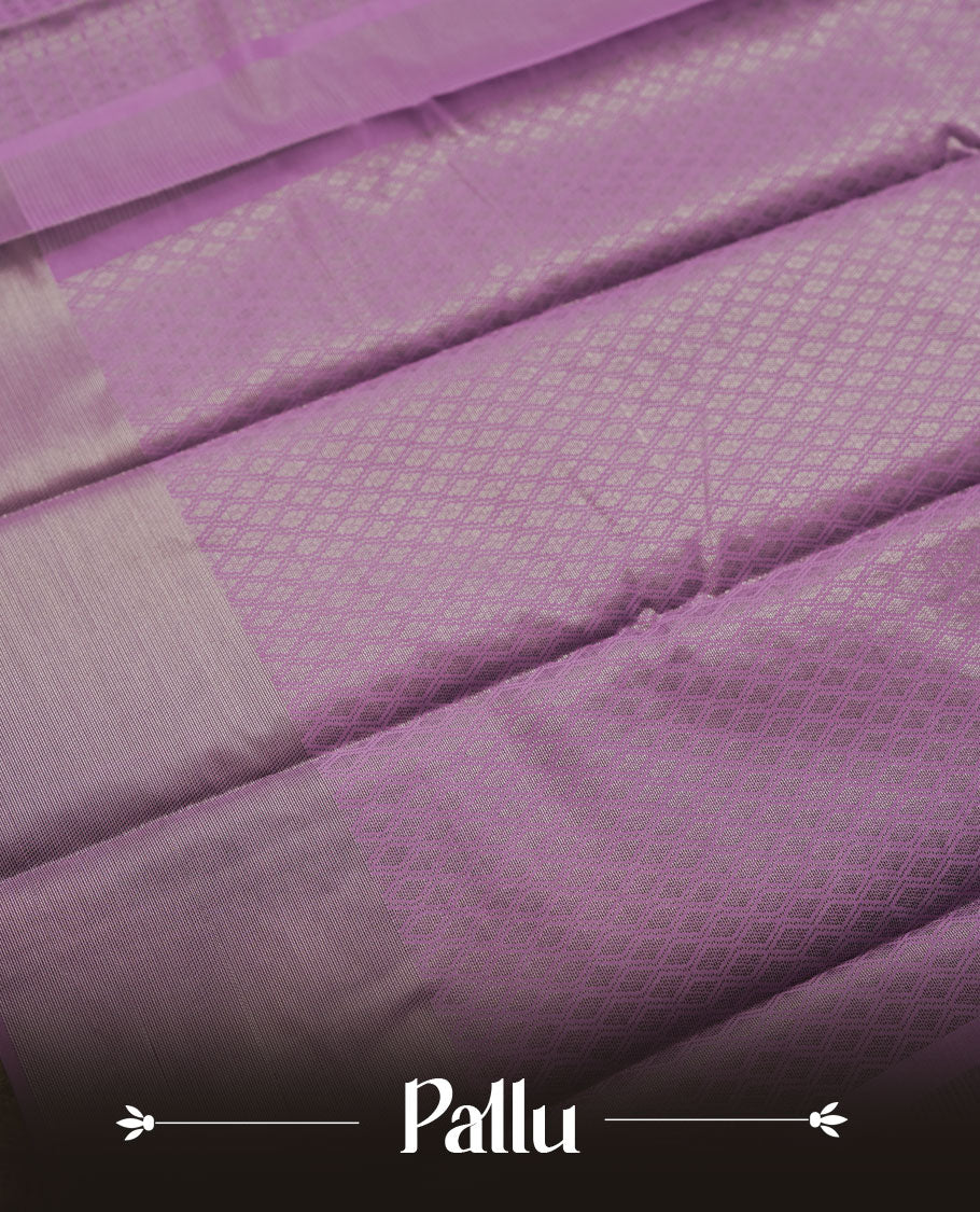 Lavender colour semi silk saree featuring neem zari Brocade Pattern all over the body, complemented by a Self Colour woven border with detailing, Pallu & blouse.