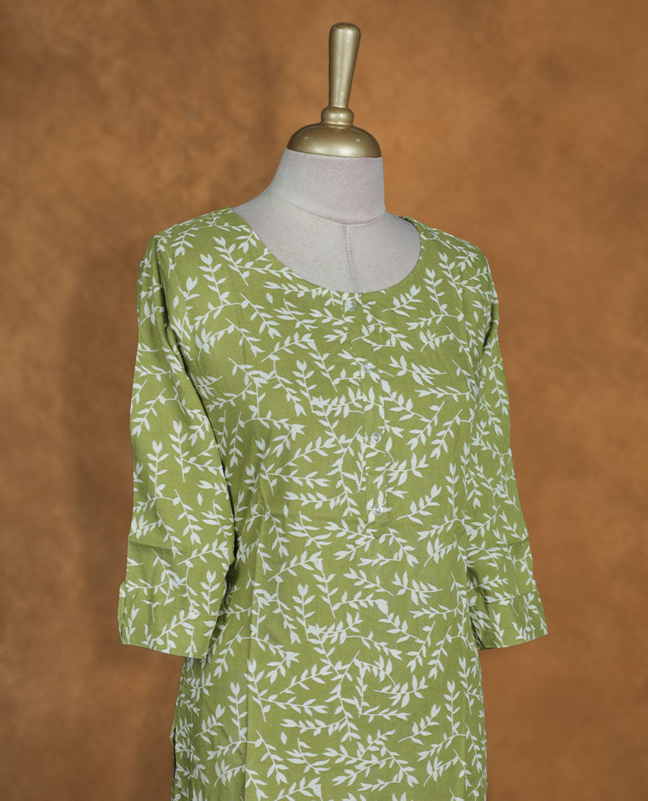 Olive colour kurti with White floral prints, knee length design, styled with a round neckline and a sleeve .