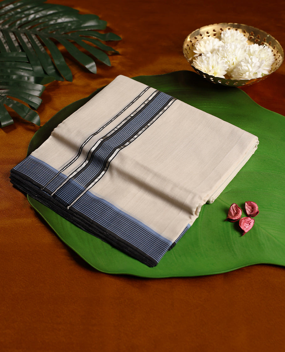 Off white pure handloom double dhoti featuring a rich black kara with elegant double line detailing, woven with fine craftsmanship to ensure comfort, durability, and traditional grace, ideal for cultural and festive occasions
