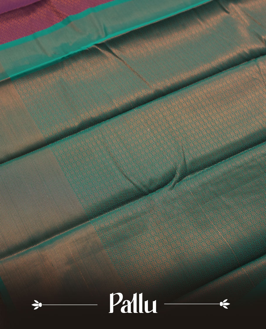 Deep purple colour semi silk saree featuring neem zari Brocade Pattern all over the body, complemented by a Self Colour woven border with detailing with contrast green Colour Pallu & blouse.