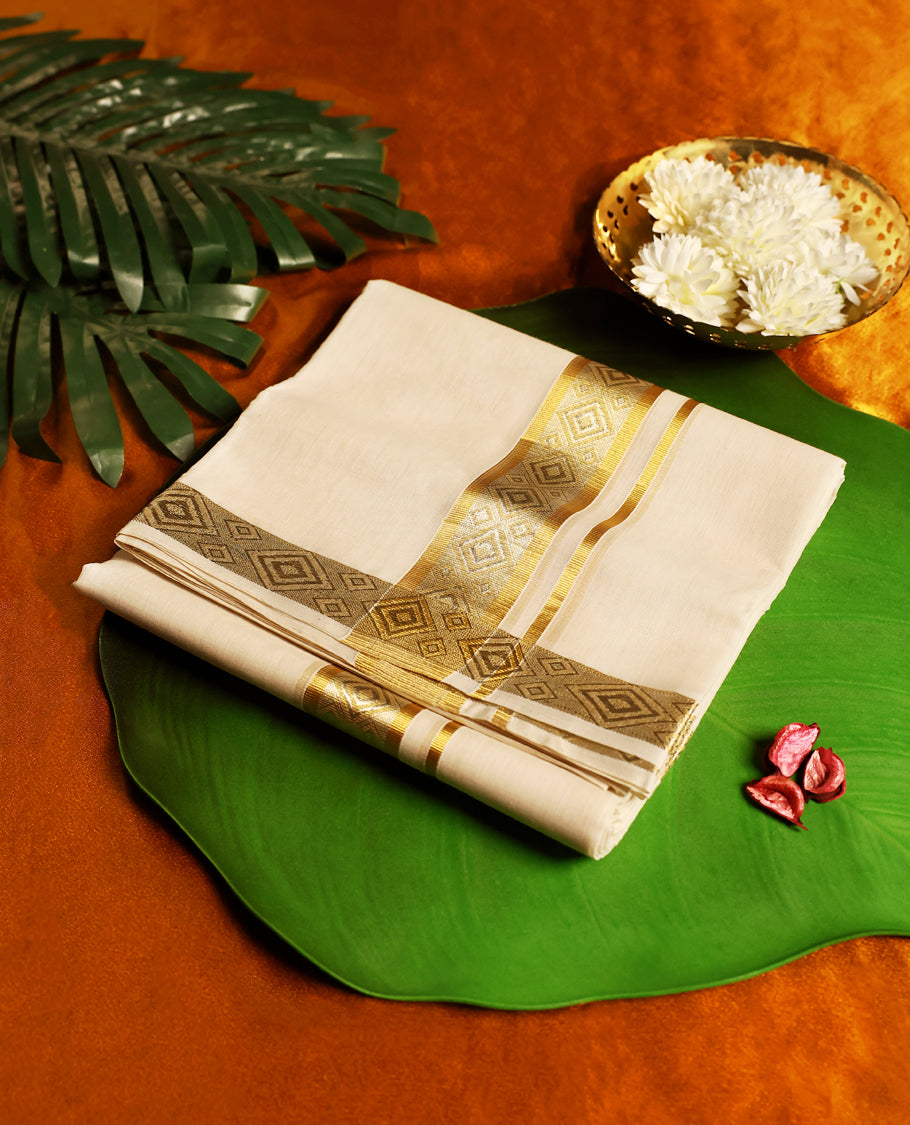 Elegant off white colour pure handloom double cotton dhoti adorned with an intricate golden zari border featuring diamond motifs, crafted for timeless elegance and breathable comfort, perfect for festive and traditional wear.