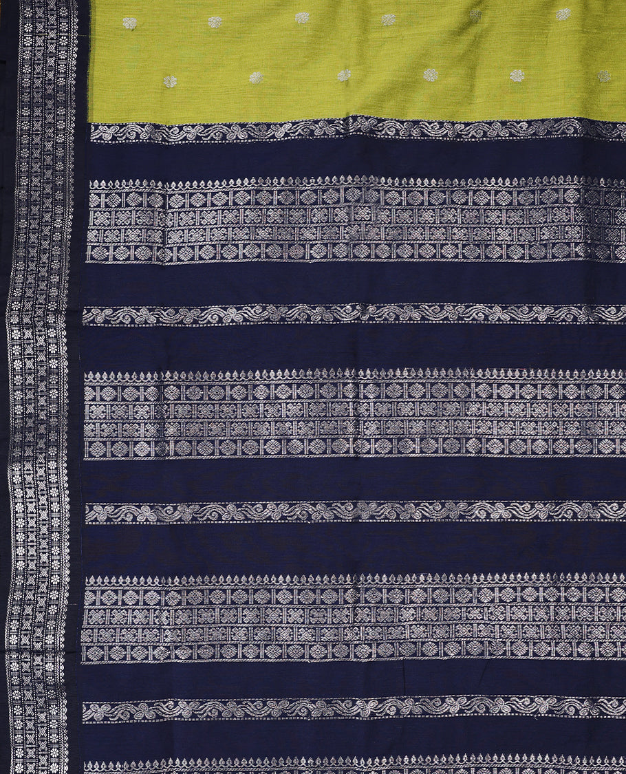 Lemon Green colour mixed Kalyani cotton saree featuring Silver zari Flower motifs throughout the body, paired with a Deep Navy Blue colour traditional border and pallu, with matching blouse