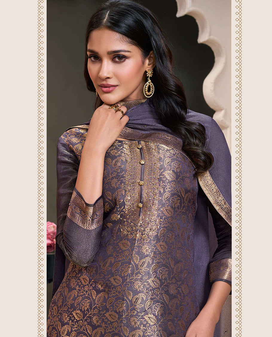 Pastel Purple Colour hand-worked shimmer jacquard top, paired with a santoon bottom and a silk georgette dupatta.