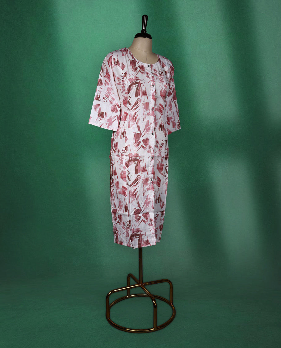 White cotton kurti with abstract Pastel maroon brushstroke prints, featuring a round neckline, front button detailing, and elbow length sleeves a stylish choice for casual daywear.