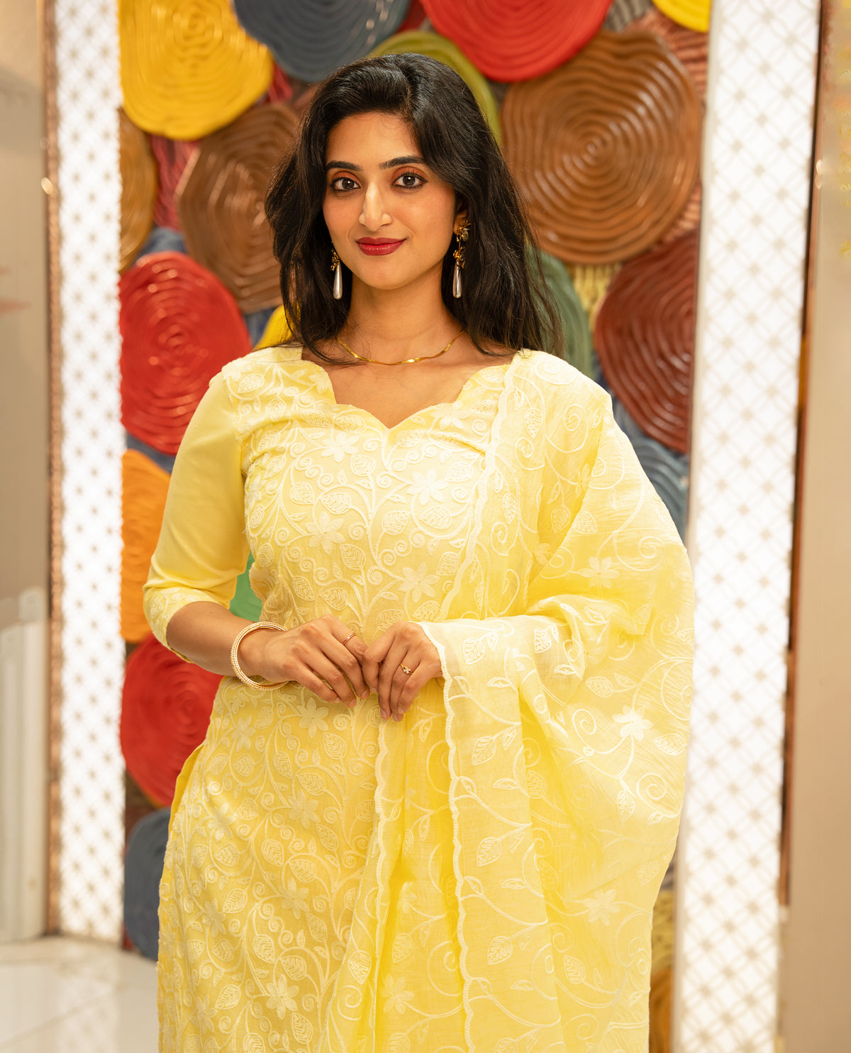 Yellow colour Mul chanderi Salwar material featuring Floral Paisley Inspired Chikankari work on body, associate with same material dupatta with Scallop border & santoon bottom, comes with lining.