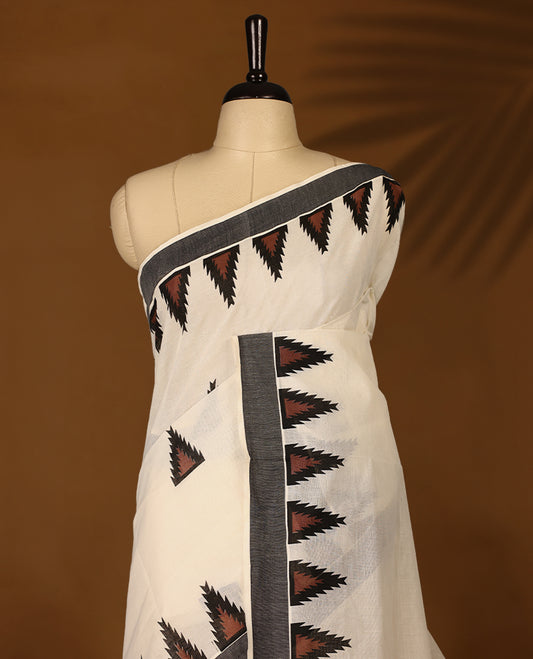 Elegant off white colour cotton Kerala saree featuring Plain body, Black colour border with brown colour temple designs, Paired with matching blouse offering a classic and graceful look