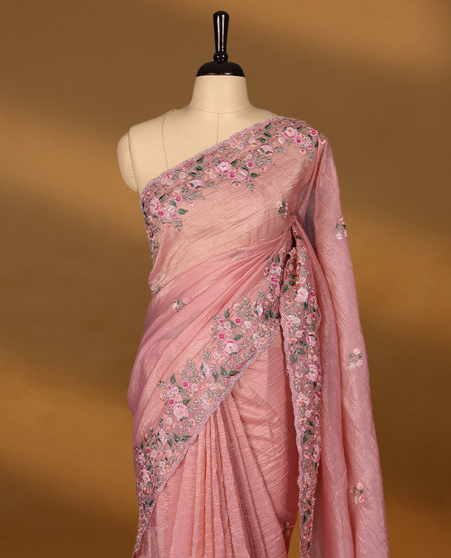 Pastel Pink Crush Soft Silk saree featuring Floral Thread Works on the body, complemented by delicate floral embroidery border and a matching blouse.