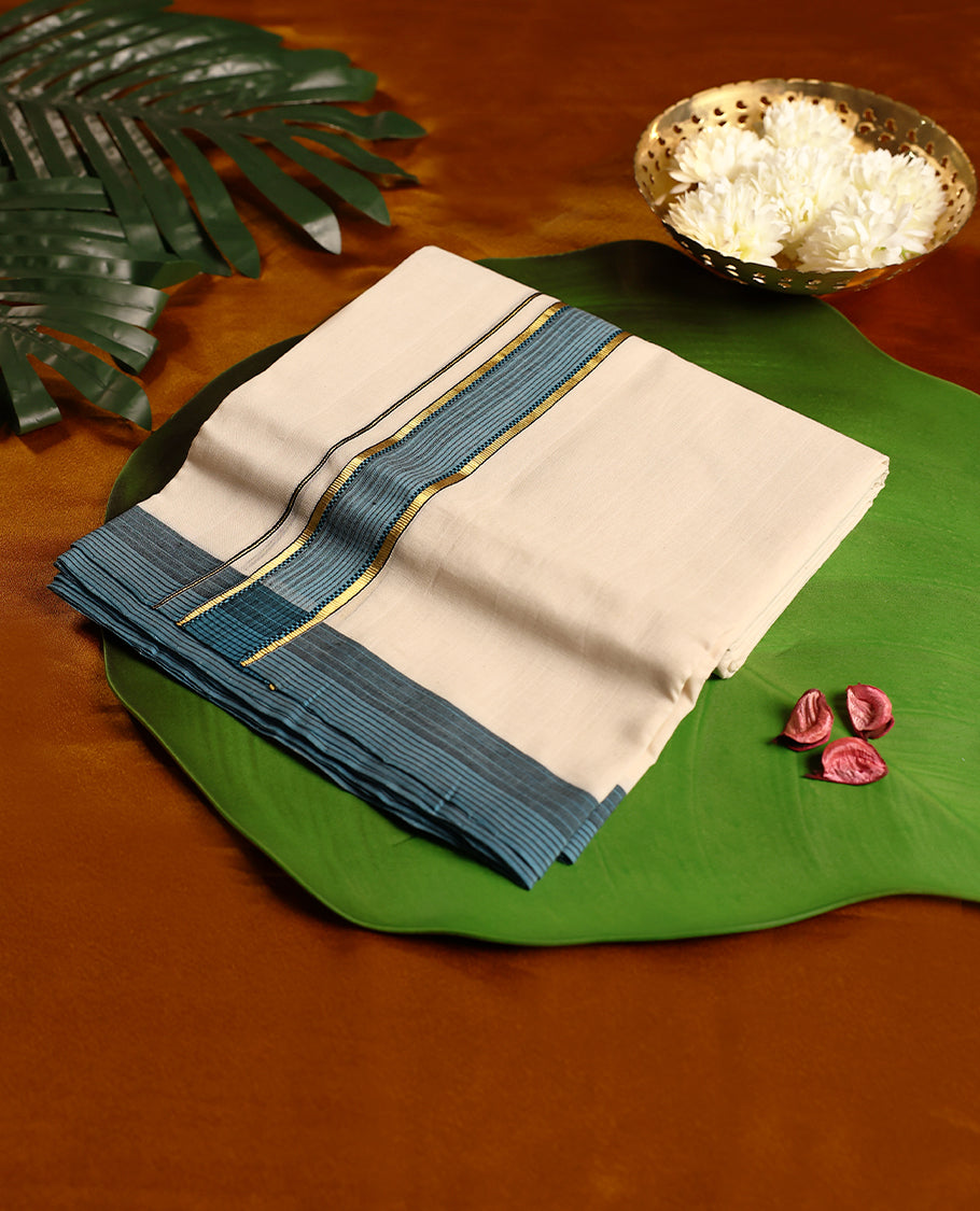 Elegant off white handloom pure cotton double dhoti featuring an elegant sky blue border with golden zari and fine black stripe accents, adding a graceful traditional charm.
