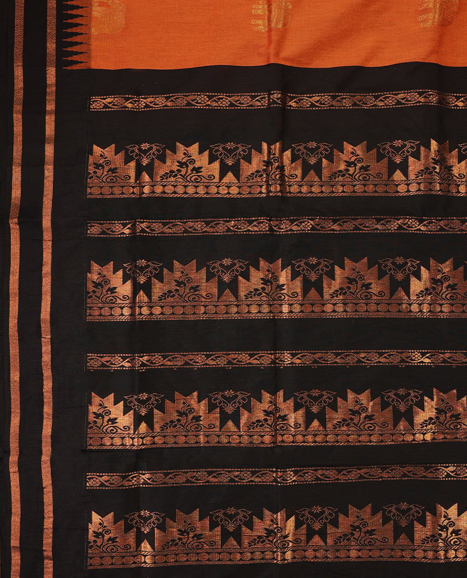 Rust Orange colour mixed Kalyani cotton saree featuring copper zari motifs throughout the body, paired with Pure Black colour traditional border and pallu, with matching blouse