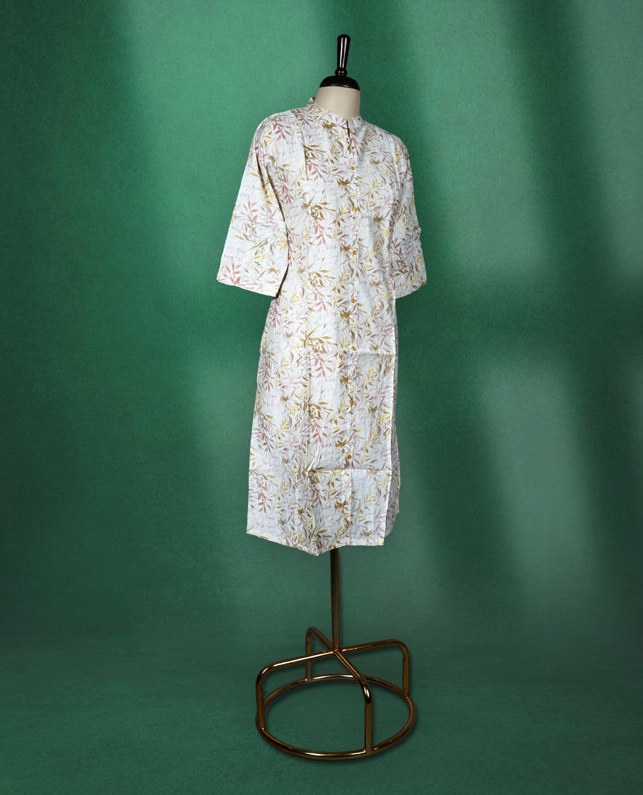 Off white cotton kurti featuring an all over leaf print, styled with a smart mandarin collar, front buttons, and elbow length sleeves perfect for a relaxed, everyday look.