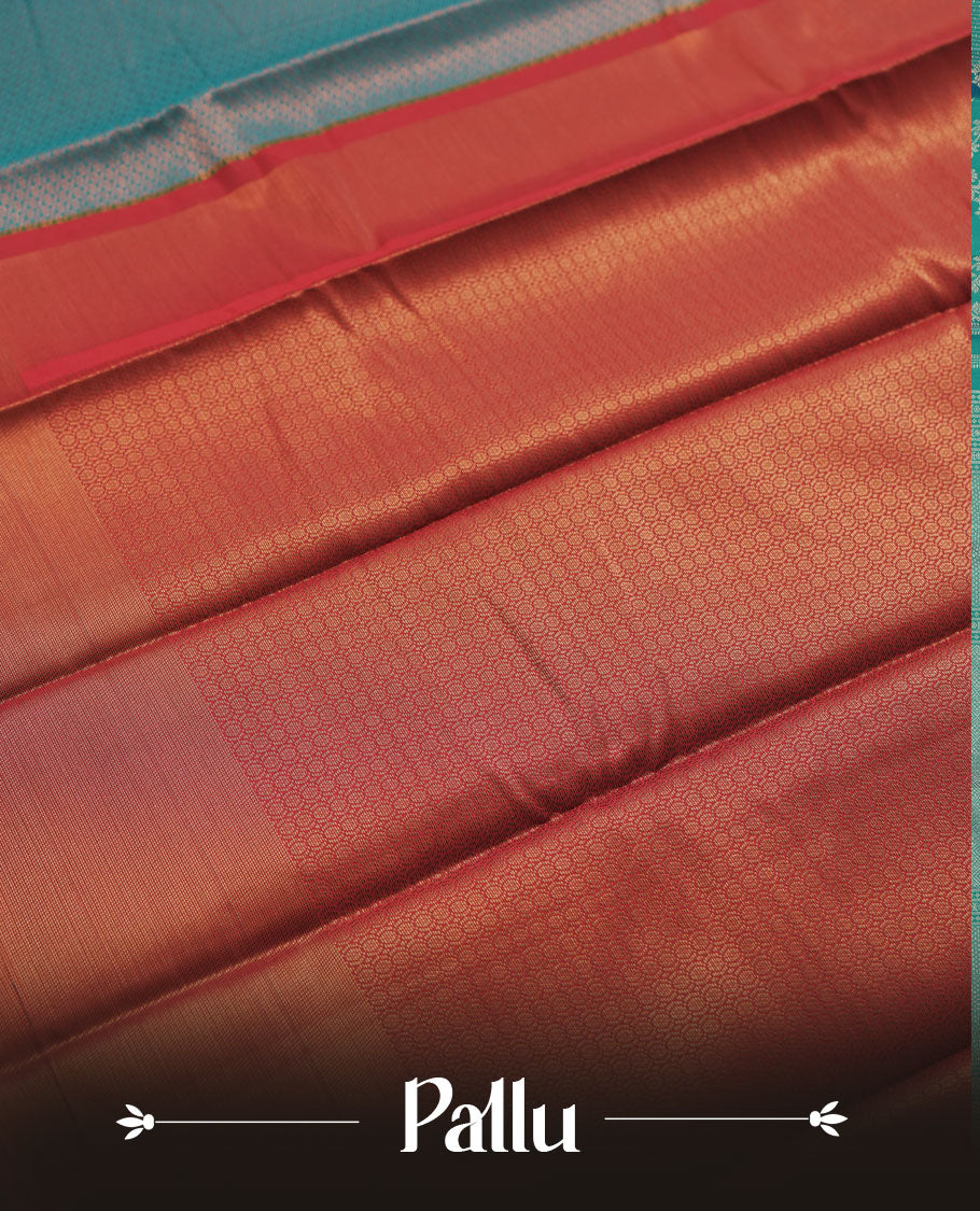 Deep aqua blue colour semi silk saree featuring neem zari Brocade Pattern all over the body, complemented by a Self Colour woven border with detailing with contrast Maroon Colour Pallu & blouse.