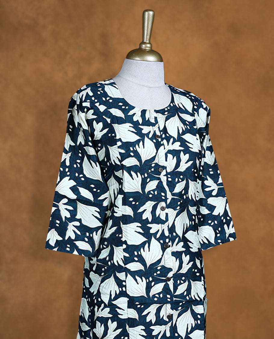 Teal and cream colour kurti with White floral prints, knee length design, styled with a round neckline and a sleeve .