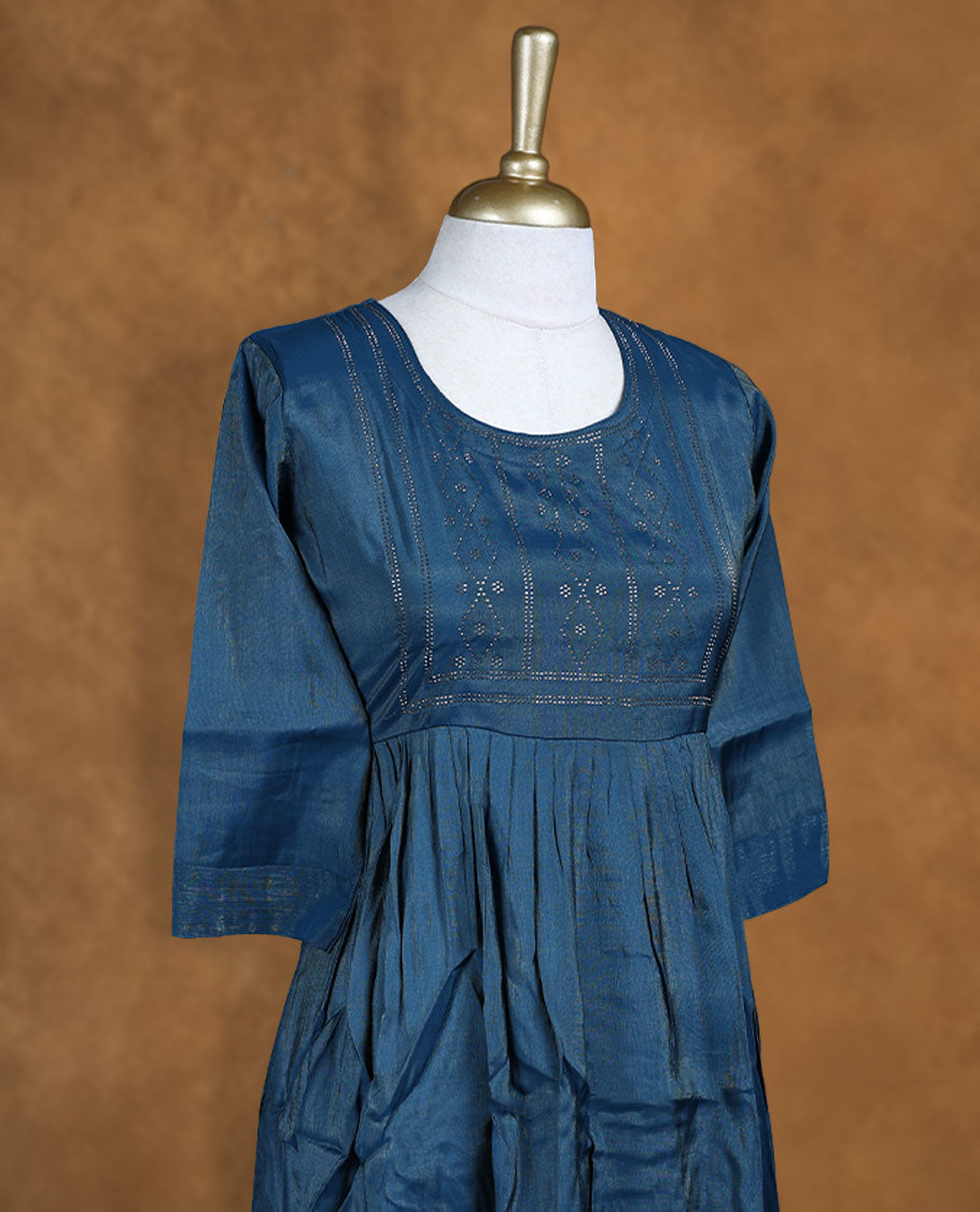 Teal blue colour kurti highlighted with delicate cutwork motifs on the yoke, styled with a scoop neckline and comfy 3/4th sleeves.