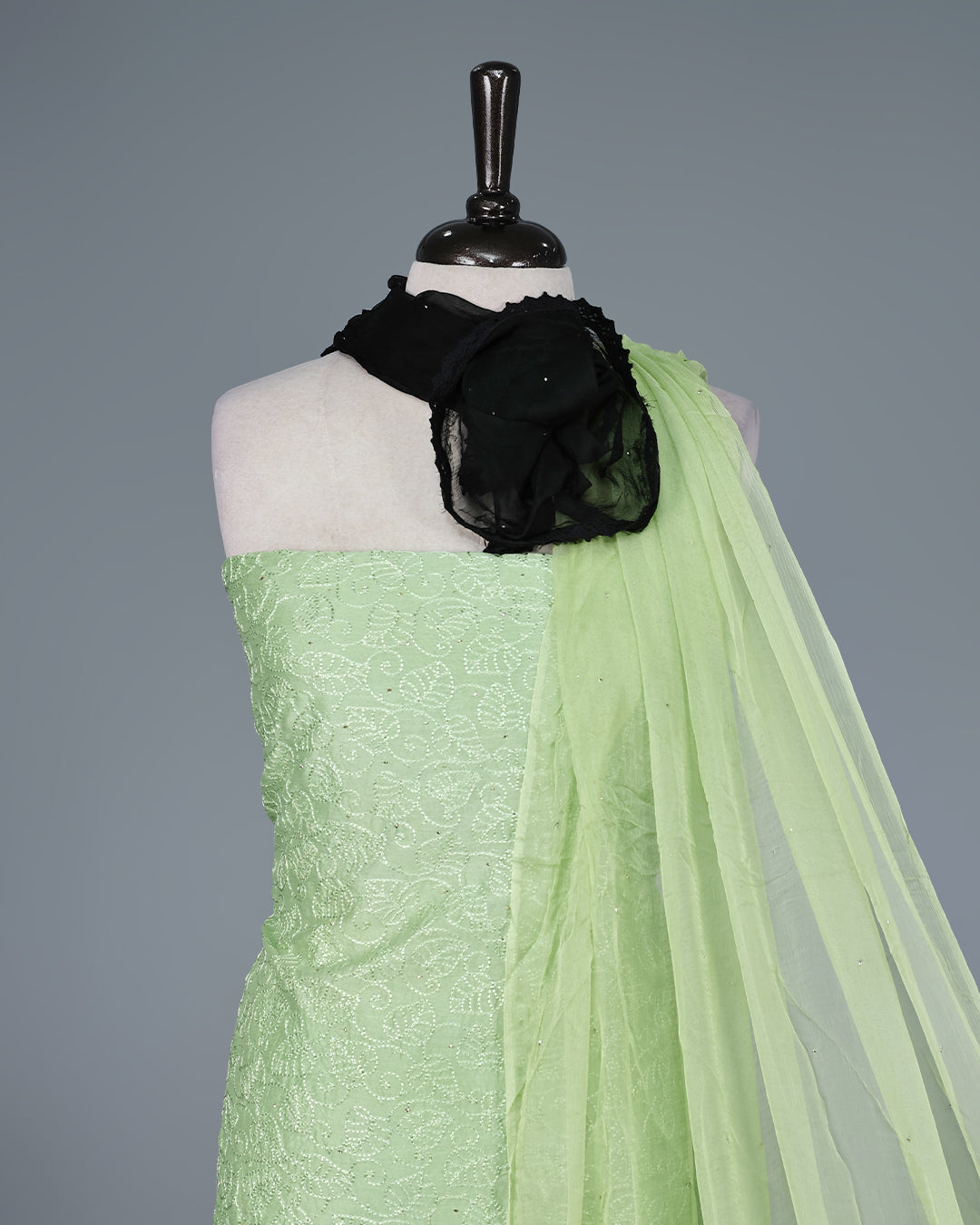 Pista Green & Black Ombre Colour Salwar Material Featuring Elegant Self Thread Embroidery on the Kurta, paired with a matching bottom & graceful shaded Dupatta.
