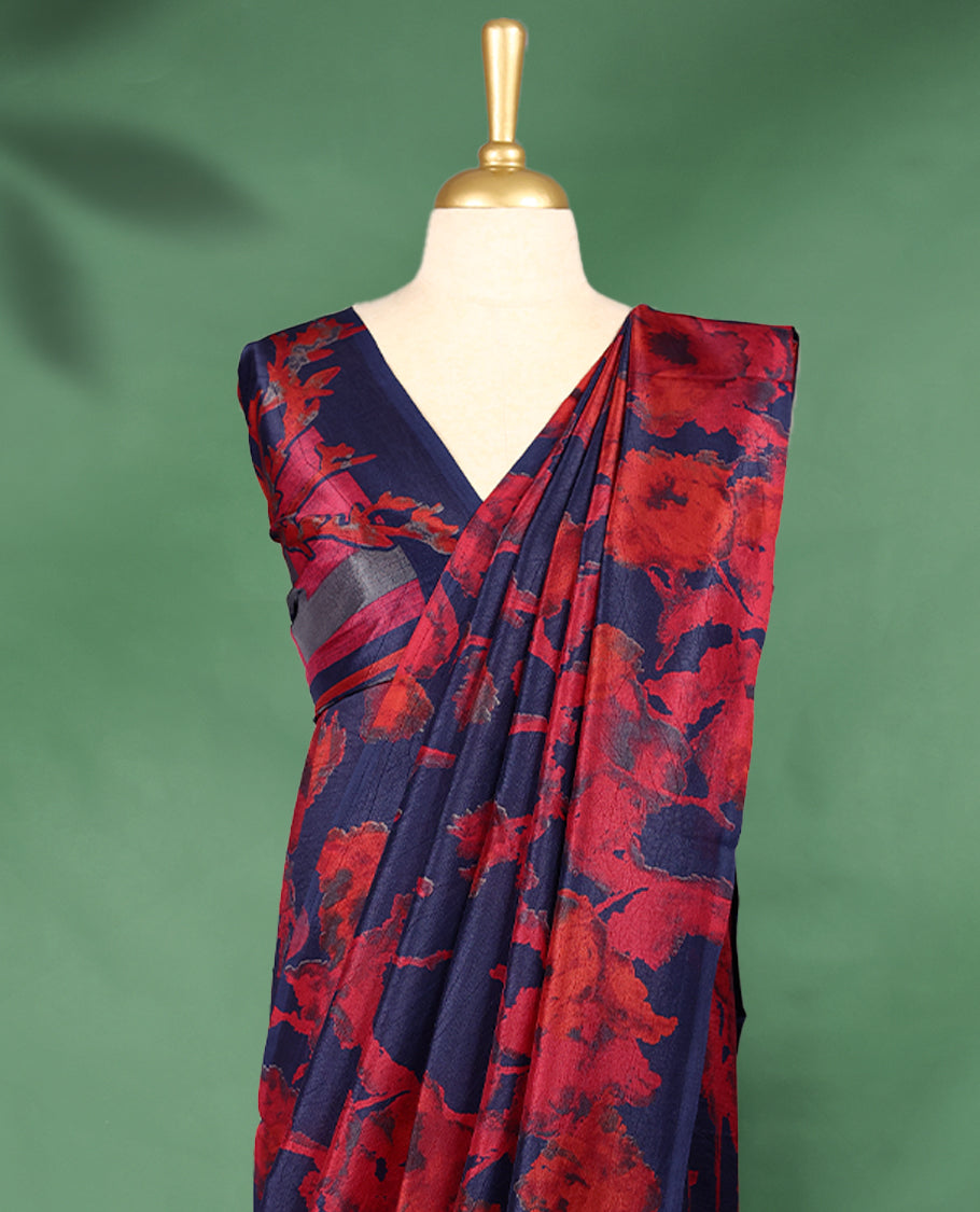 Navy blue colour Manipuri saree featuring oversized crimson red floral motifs, finished without a border, and paired with a matching blouse.