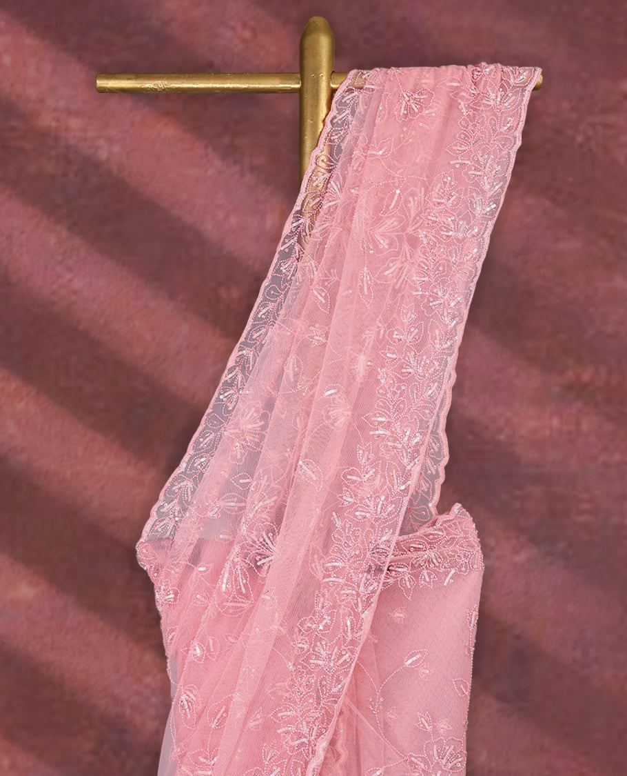 Light Pink colour net designer saree featuring beads and sequin floral kodi detailing on the body, adorned with beads and sequin worked floral kodi scallop border, paired with a matching worked blouse