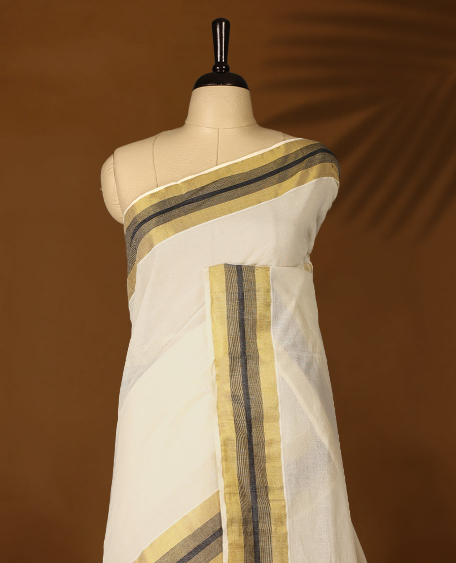 Elegant off white colour cotton Kerala saree featuring Plain body, Black colour & golden zari kasavu border offering a classic and graceful look, paired with a matching blouse.