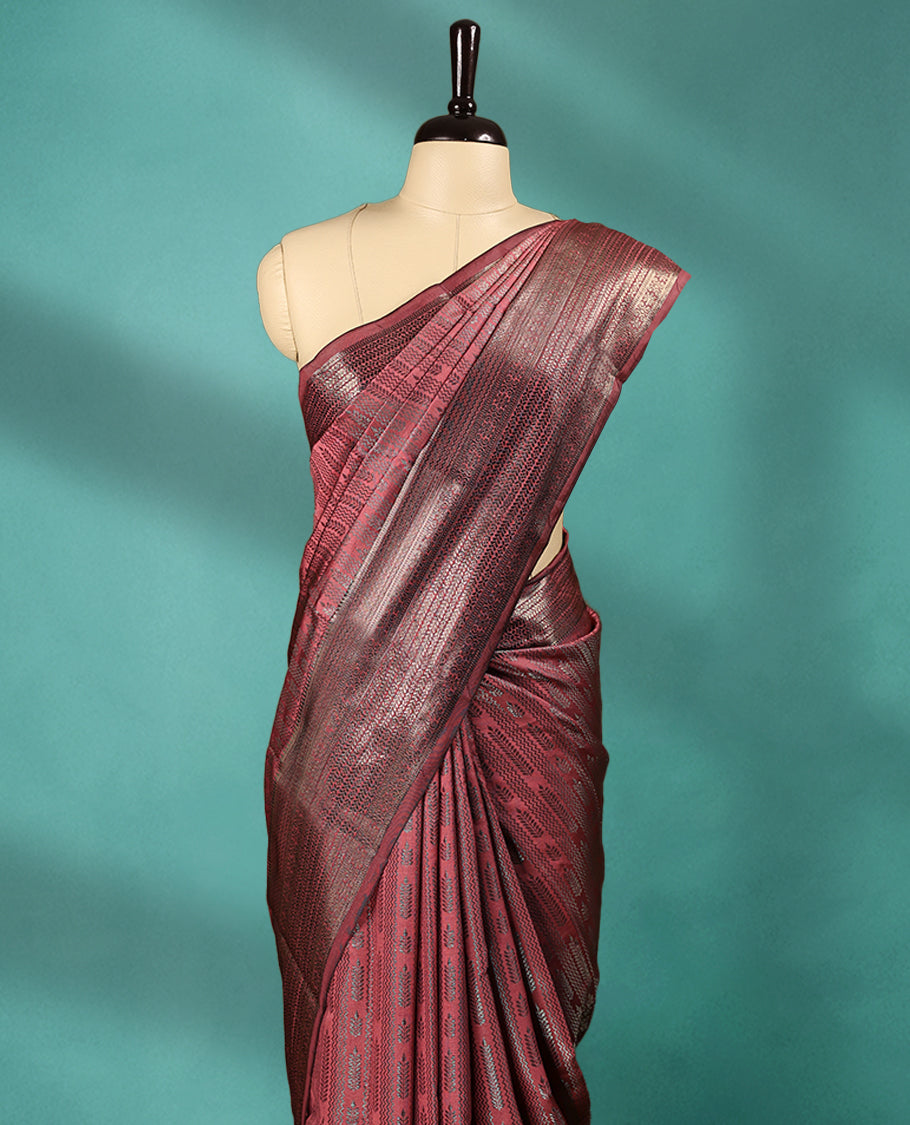 Deep Rose Art Soft Silk Saree showcases intricate silver zari work on the body and border, paired with a matching blouse