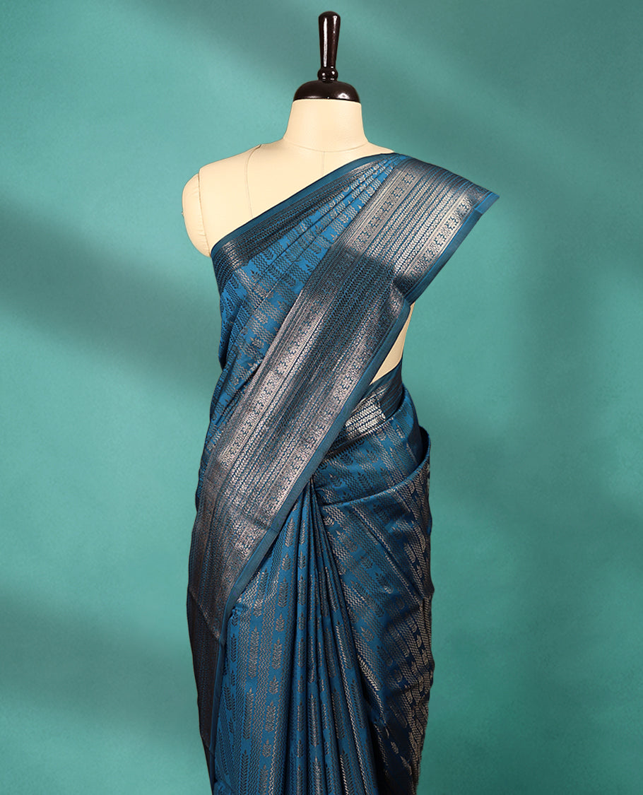 Blue Art Soft Silk Saree showcases intricate silver zari work on the body and border, paired with a matching blouse