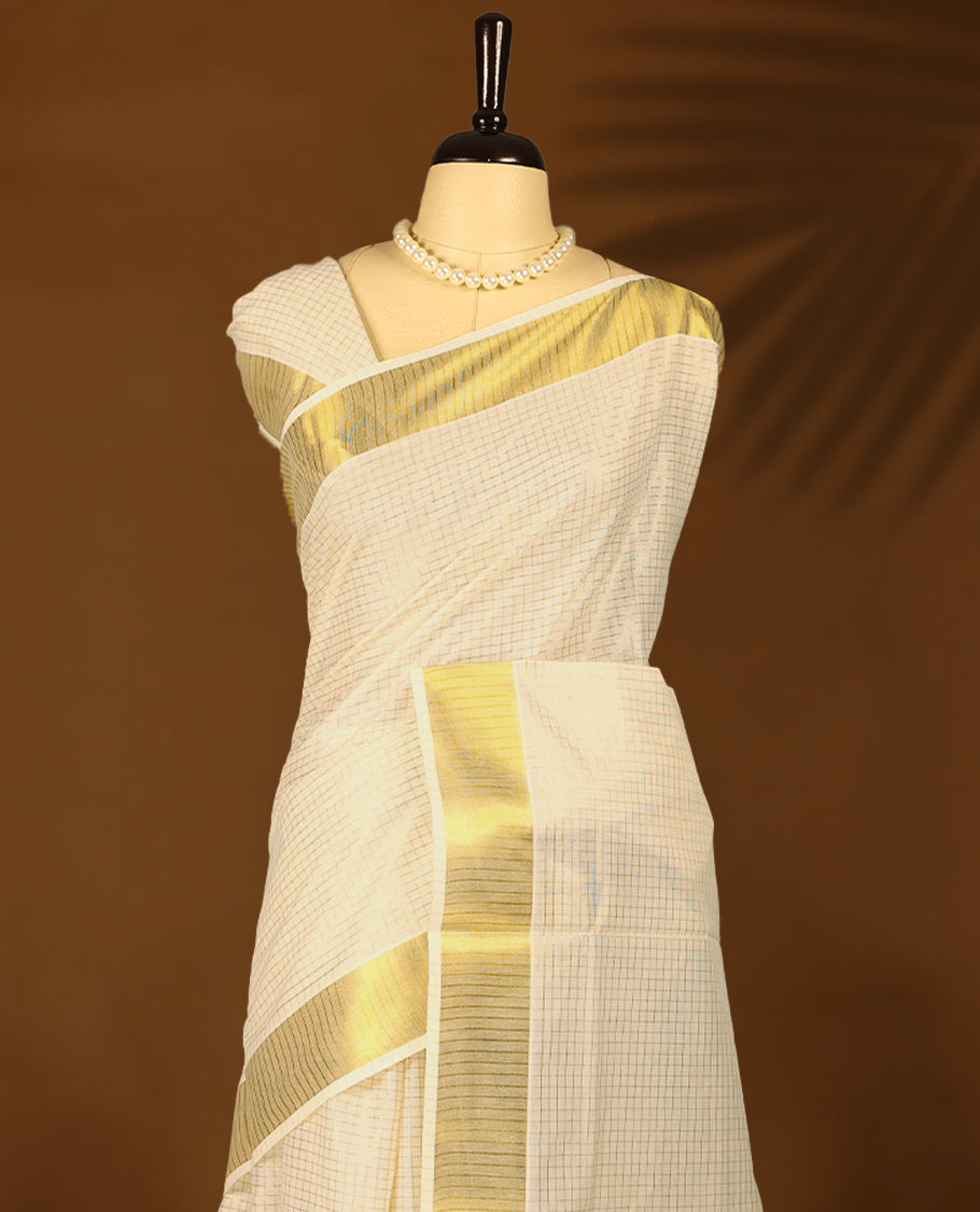 Kerala cotton saree with fine Small golden Checks and Golden border with Matching Blouse