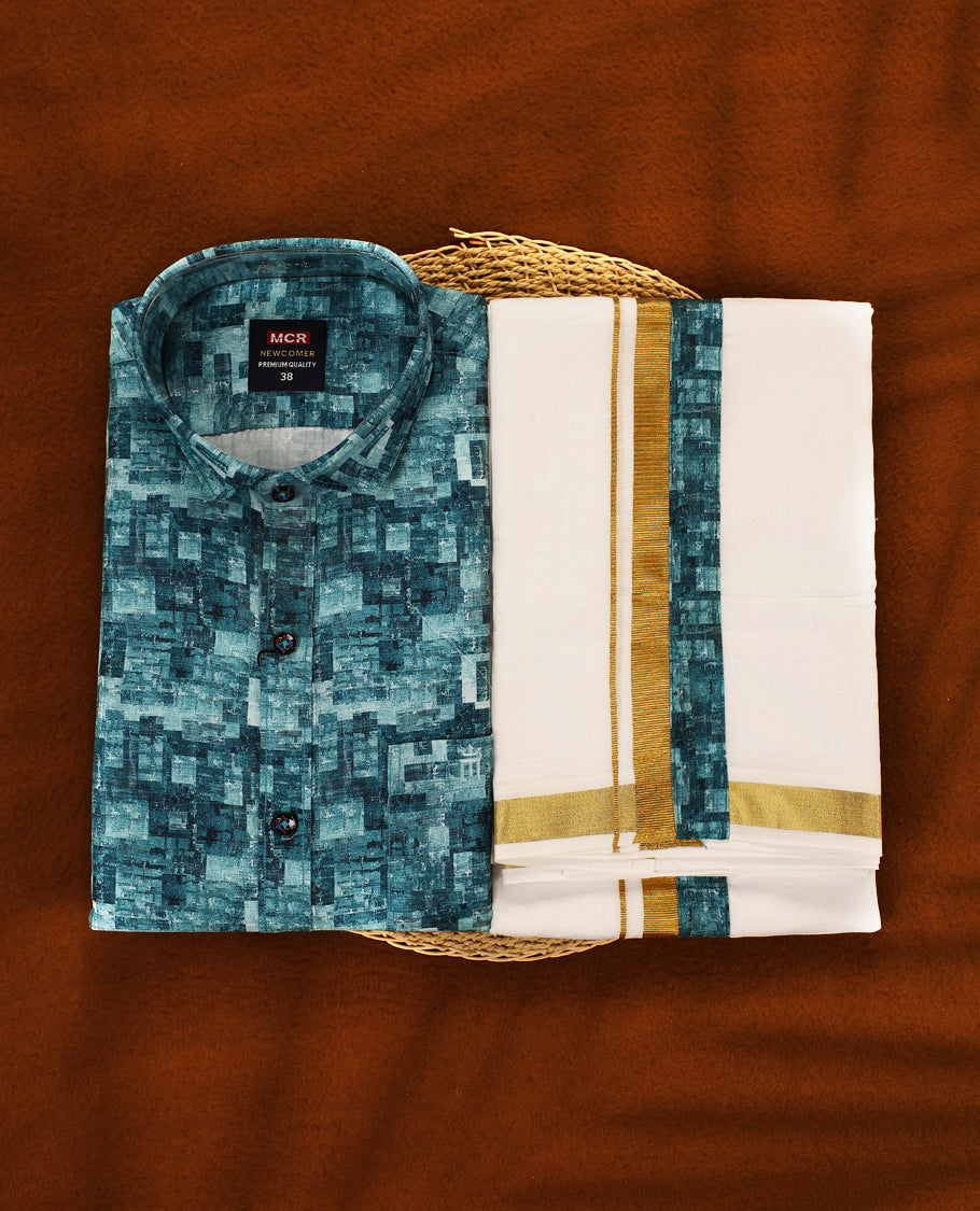 Pastel Aqua colour MCR full sleeve shirt featuring all over abstract prints, paired with a white dhoti adorned with a rich golden zari kara and a matching printed border.