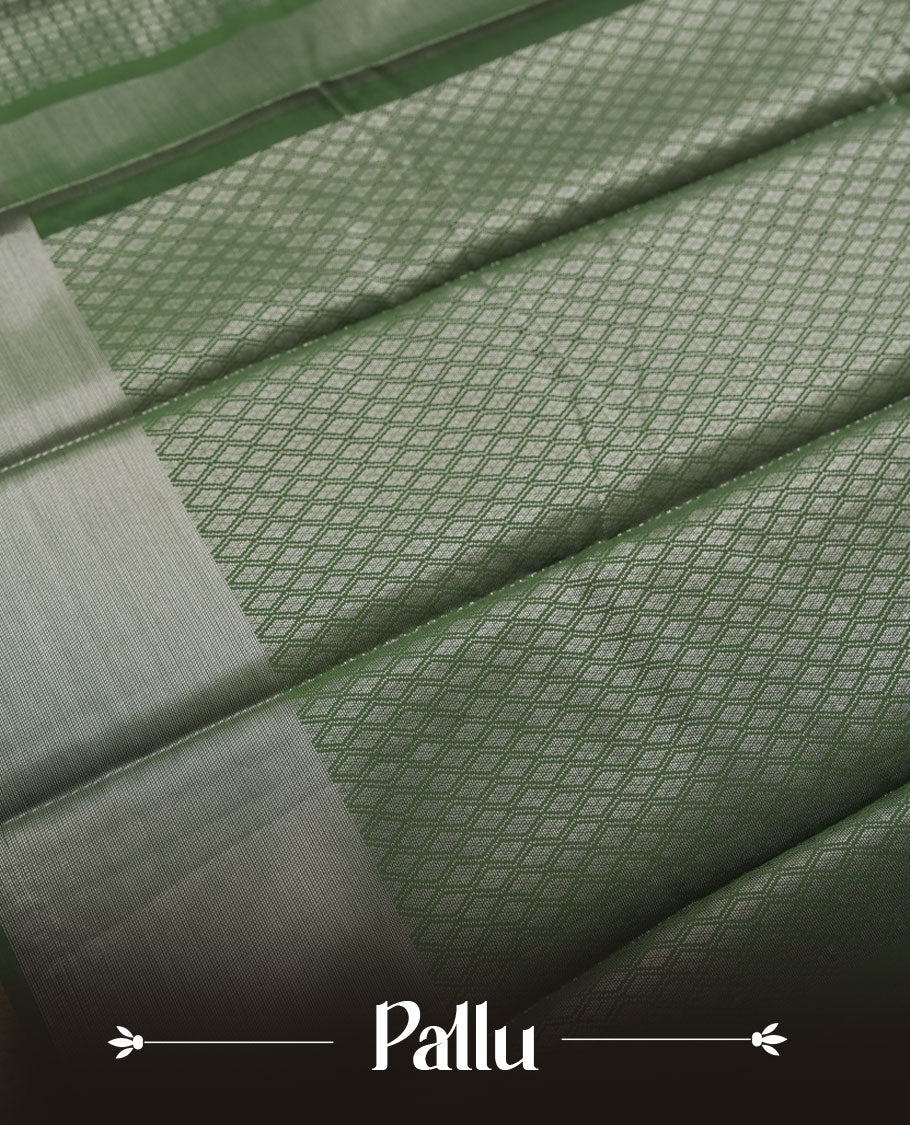 Dark green colour semi silk saree featuring neem zari Brocade Pattern all over the body, complemented by a Self Colour woven border with detailing, Pallu & blouse.