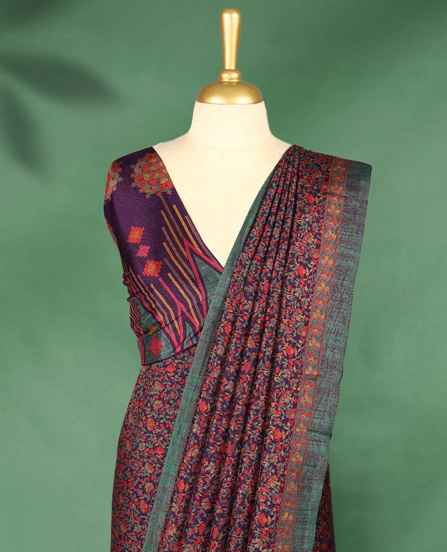 Deep Purple colour Manipuri saree featuring intricate all over floral motifs in vivid tones, framed with a teal and rust red woven border and a matching blouse.