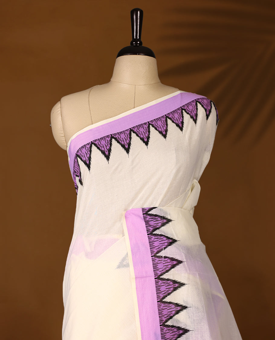 Elegant off white colour cotton Kerala saree featuring Plain body, Lavender colour border with temple designs, Paired with matching blouse offering a classic and graceful look, paired with a matching blouse.