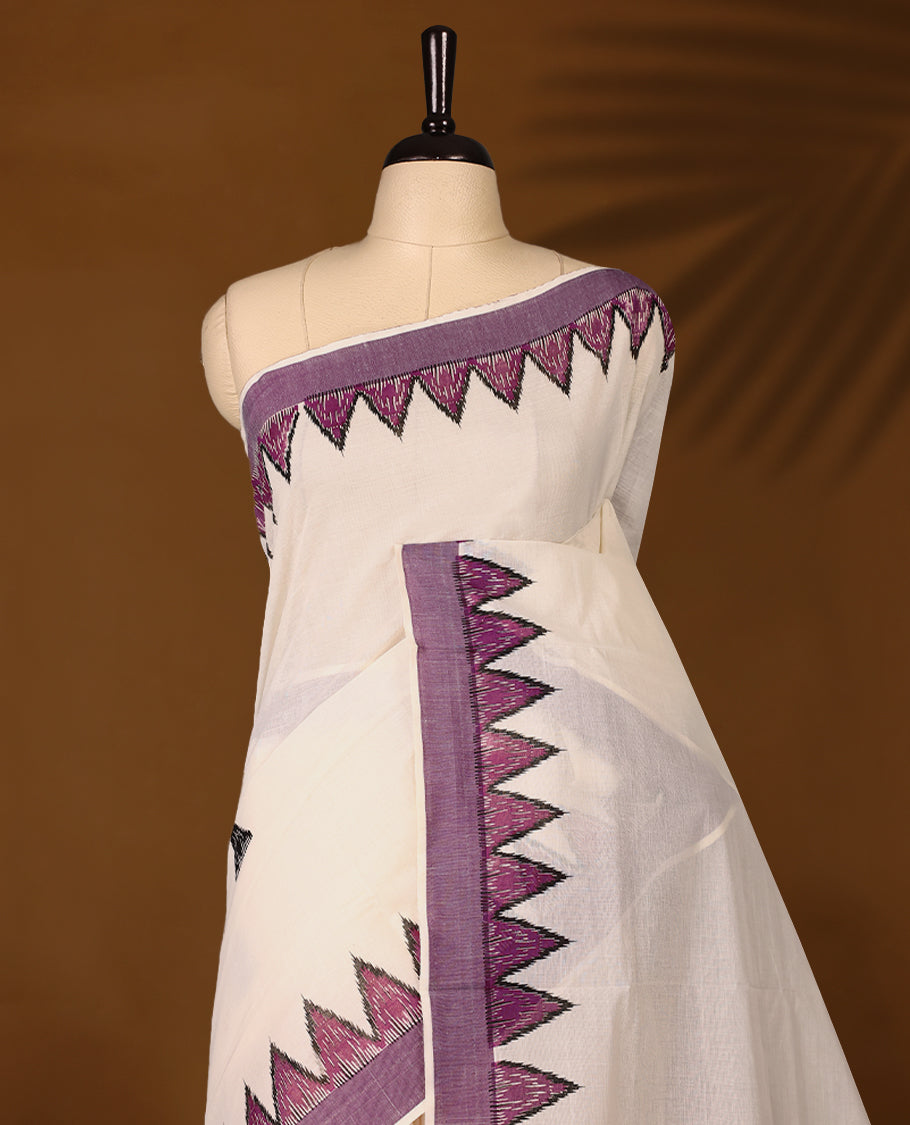 Elegant off white colour cotton Kerala saree featuring Plain body, Purple colour border with Purple colour temple designs, Paired with matching blouse offering a classic and graceful look