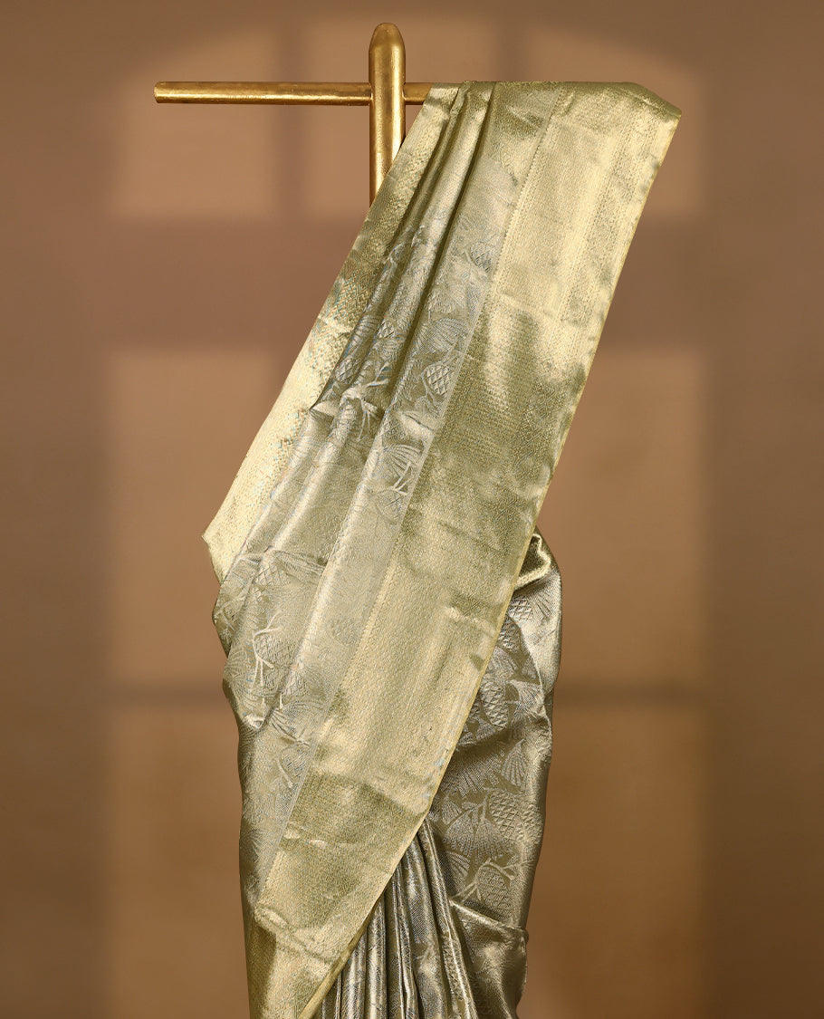 Pastel Gold Colour Kancheepuram Tissue Silk Saree having Zari Worked Body with Self Coloured Brocade Border and Blouse