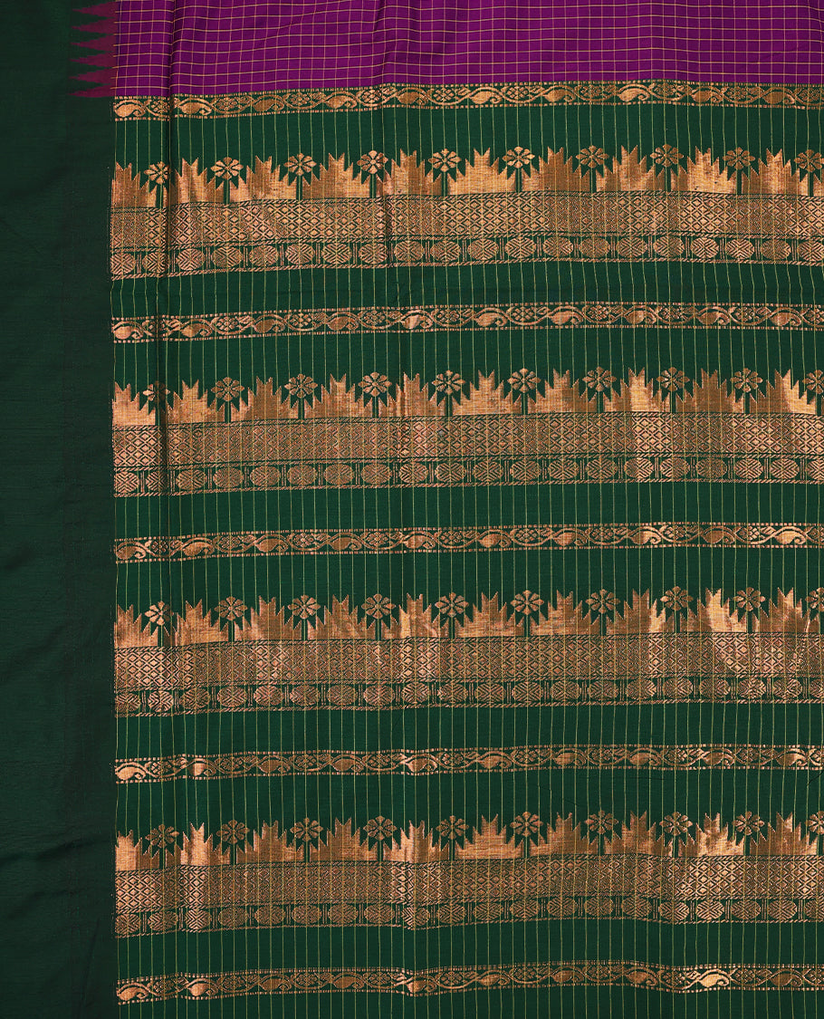 Purple colour mixed Kalyani cotton saree featuring Yellow zari checks throughout the body, paired with a Bottle Green colour traditional border and pallu, with matching blouse