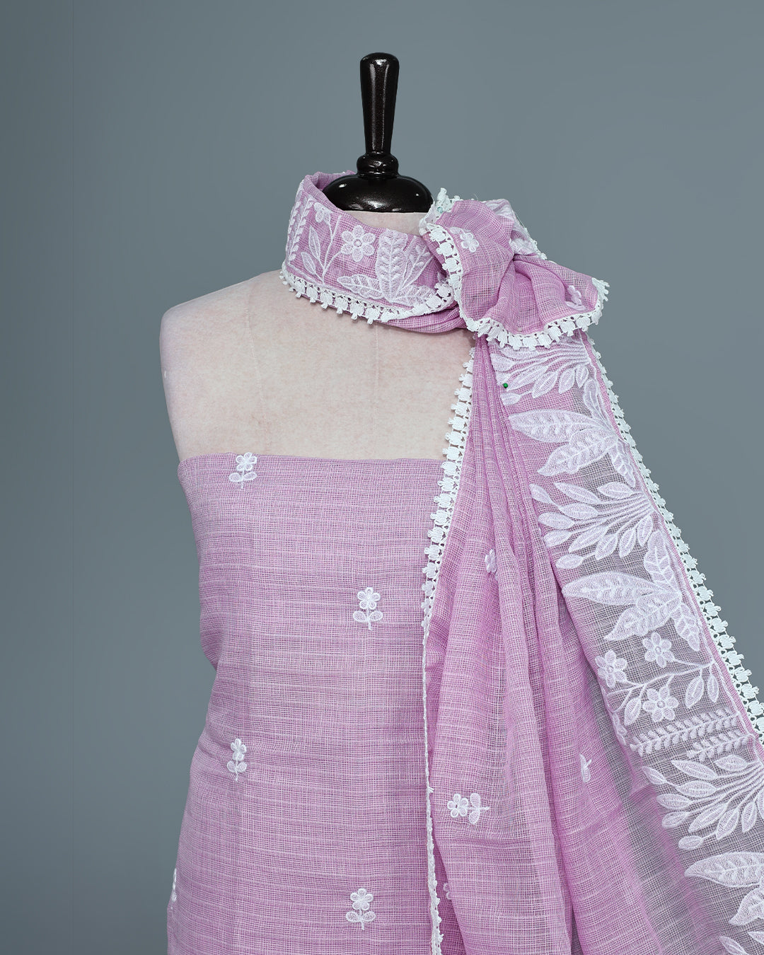 Pastel lavender Colour Kotta Net Salwar Material Featuring Elegant White Floral Thread Embroidery on the Kurta, paired with a matching bottom & beautifully embroidered Dupatta.